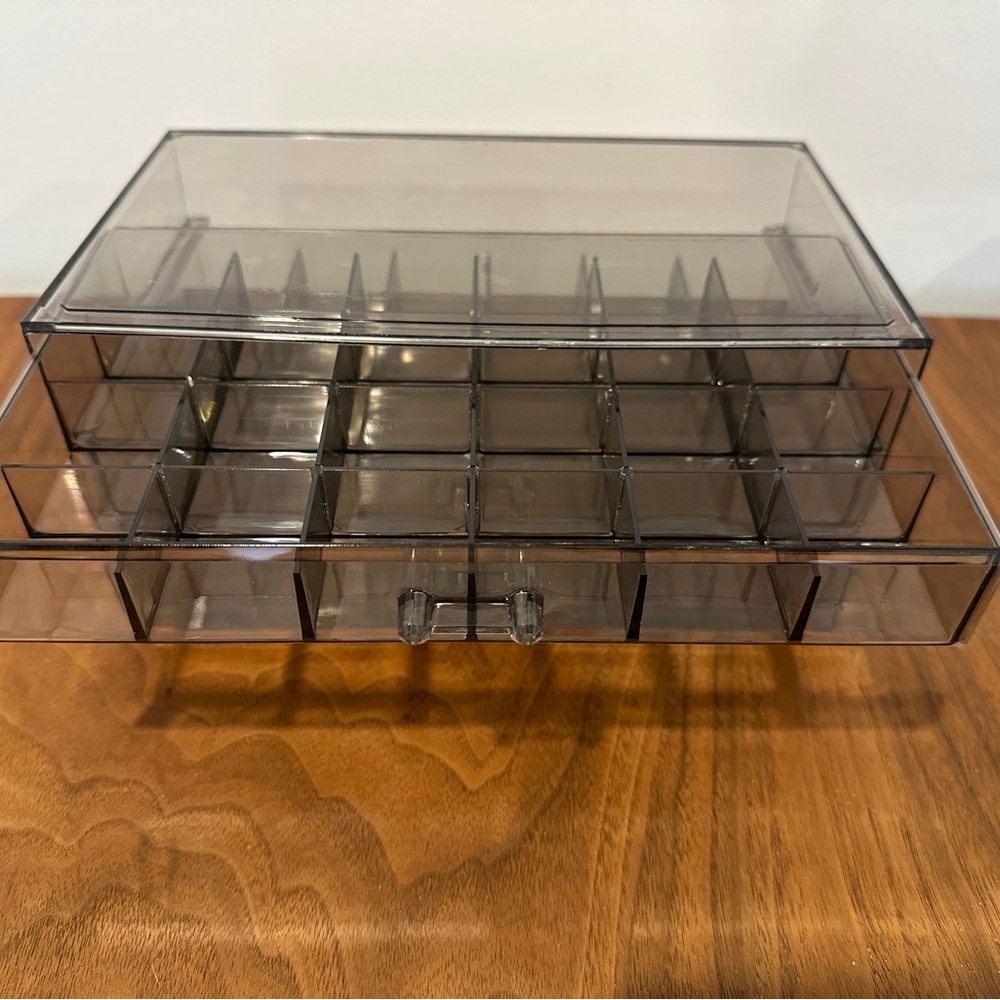 Smoky plastic jewellery box.
